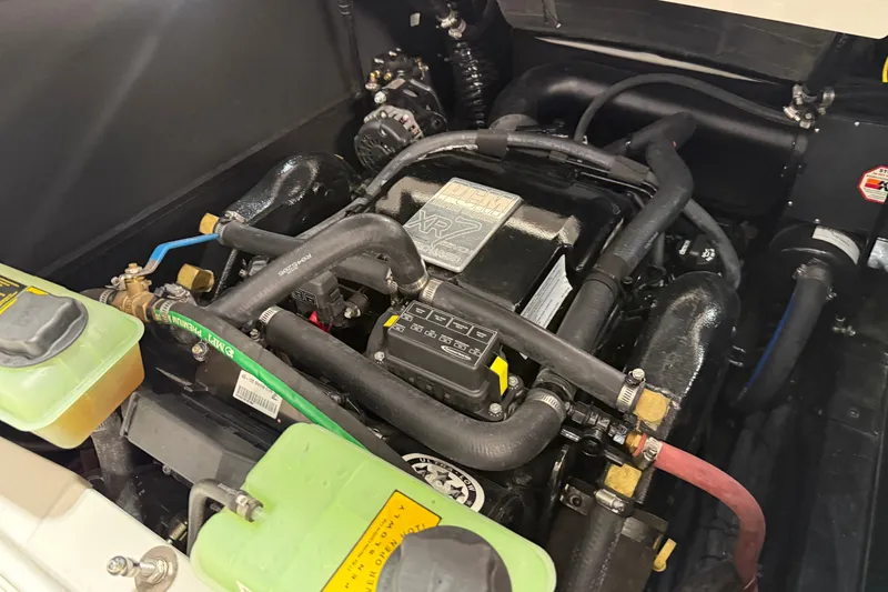 Slide: The Image of Engine compartment of a 2019 Nautique Super Air Nautique G25 boat. - 26