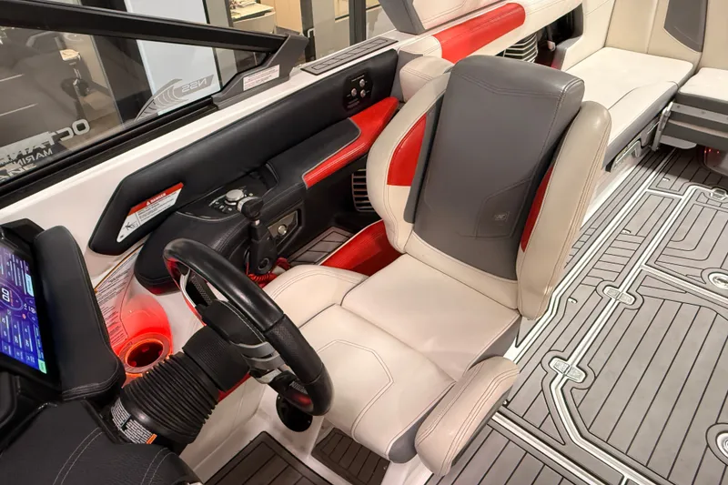 Slide: The Image of 2019 Nautique Super Air Nautique G25 interior with modern dashboard and seating. - 19