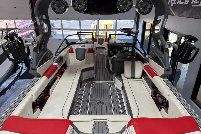 Slide: The Image of 2019 Nautique Super Air Nautique G25 interior with luxurious seating and advanced audio system. - 35