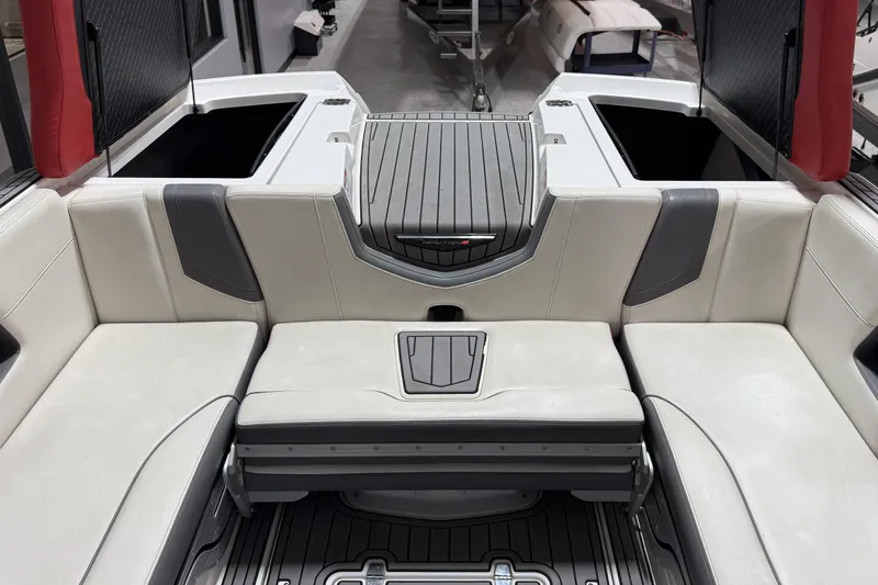 Slide: The Image of 2019 Nautique Super Air Nautique G25 interior with spacious seating and modern design. - 21
