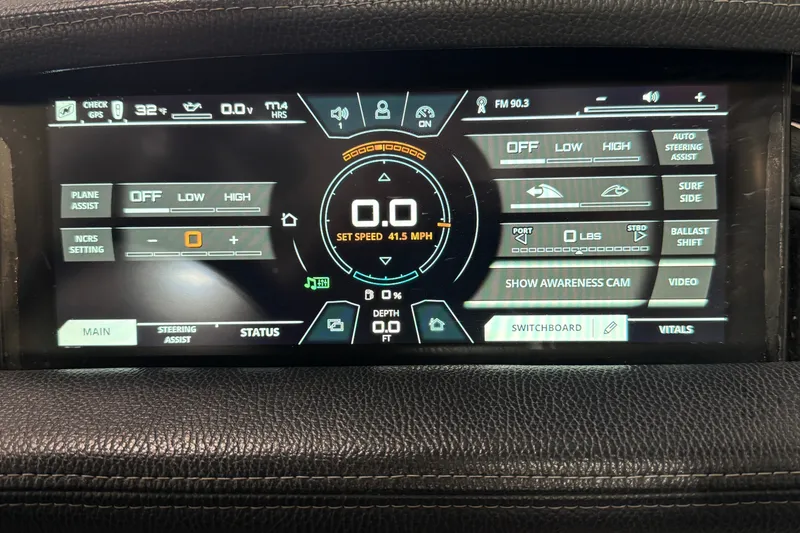 Slide: The Image of 2019 Nautique Super Air Nautique G25 dashboard display with speed, settings, and controls. - 42