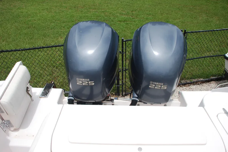 Slide: The Image of Twin Yamaha 225 engines on a 2003 Grady-White Chase 273 boat. - 16