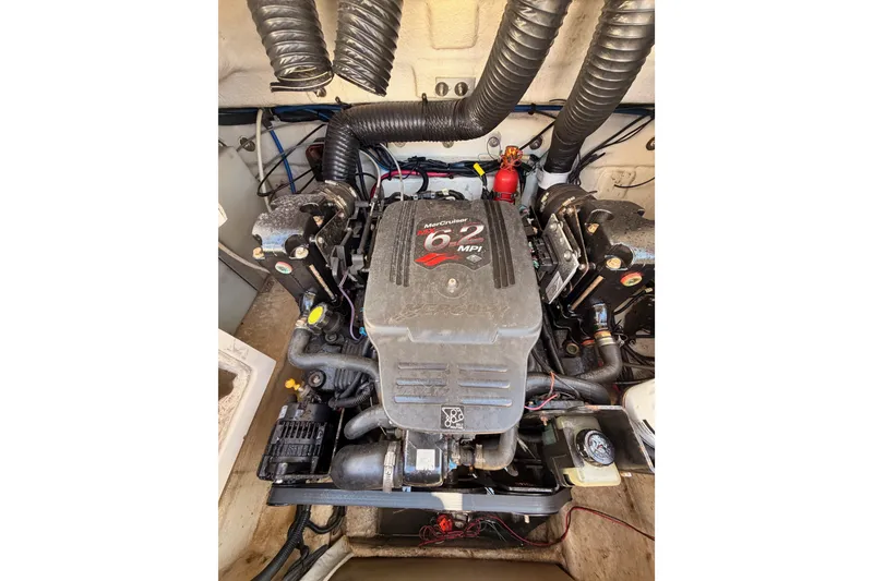 Slide: The Image of Engine compartment of a 2005 Sea Ray 240 Sundeck with MerCruiser 6.2 MPI engine. - 28