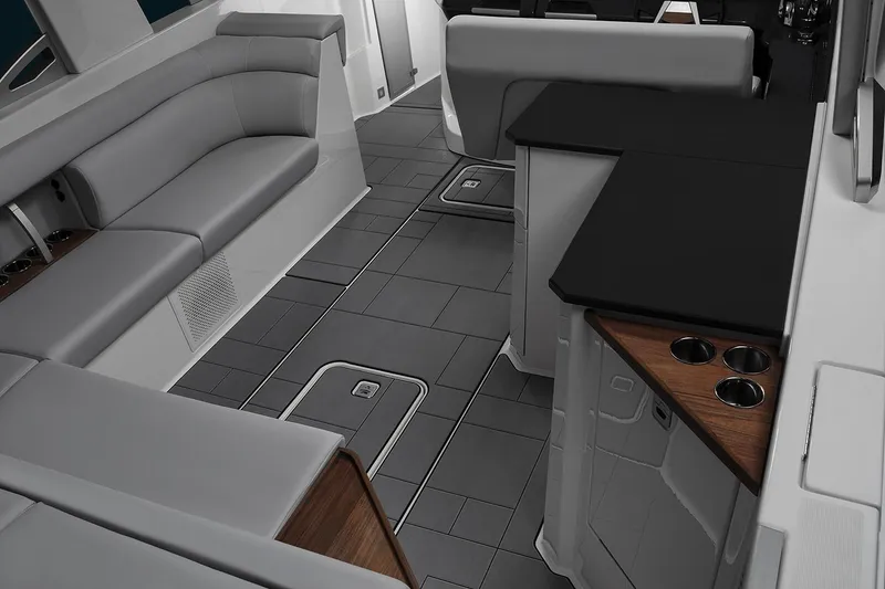 Slide: The Image of Manufacturer Provided Image: 2024 Aviara AV32 I/O boat interior with gray seating and modern design. - 14