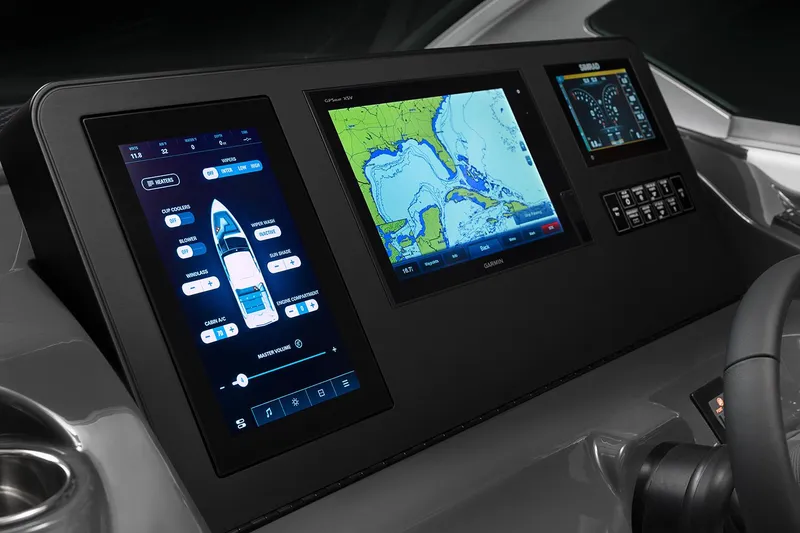 Slide: The Image of Manufacturer Provided Image: 2024 Aviara AV32 I/O boat dashboard with advanced navigation and control screens. - 13