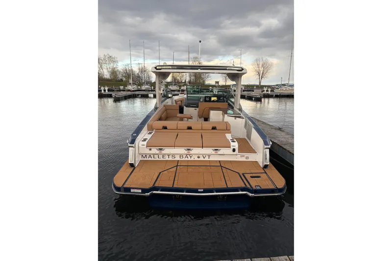 Slide: The Image of 2024 Aviara AV32 I/O boat docked at Mallets Bay, Vermont marina. - 2