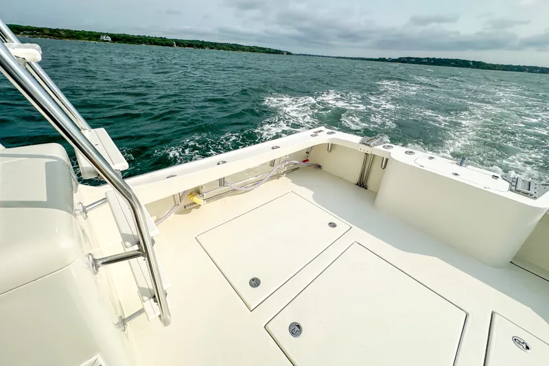 Slide: The Image of Northern Bay 36 boat deck, 2003 model, cruising on open water. - 21
