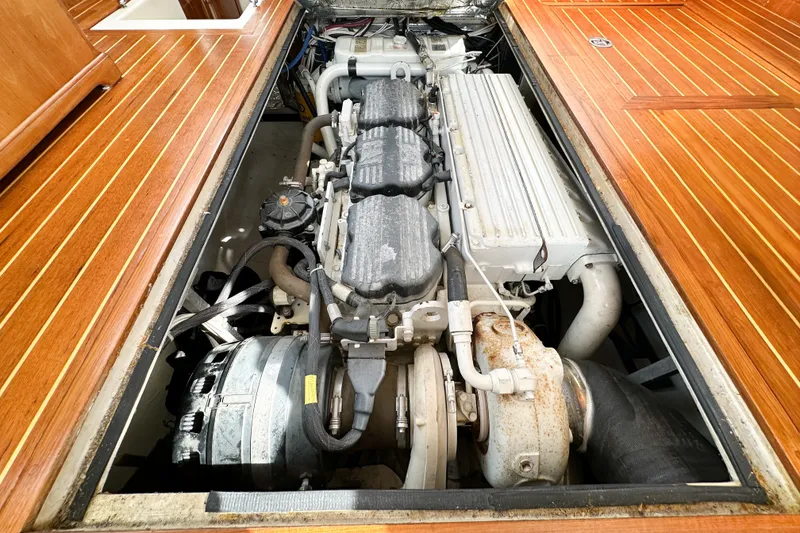 Slide: The Image of Engine compartment of a 2003 Northern Bay 36 boat, showcasing detailed machinery. - 56