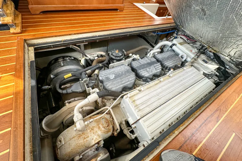 Slide: The Image of Engine compartment of a 2003 Northern Bay 36 boat with visible components. - 57