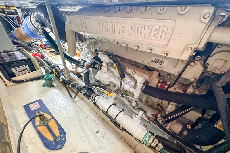 Slide: The Image of Engine room of a 2003 Northern Bay 36 boat featuring CAT Marine Power engine. - 60