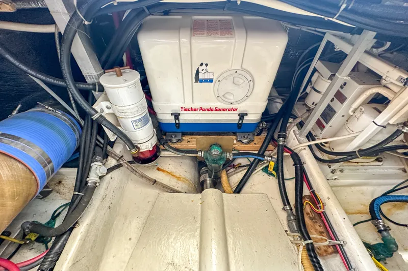 Slide: The Image of Engine room of a 2003 Northern Bay 36 with Fischer Panda generator. - 61