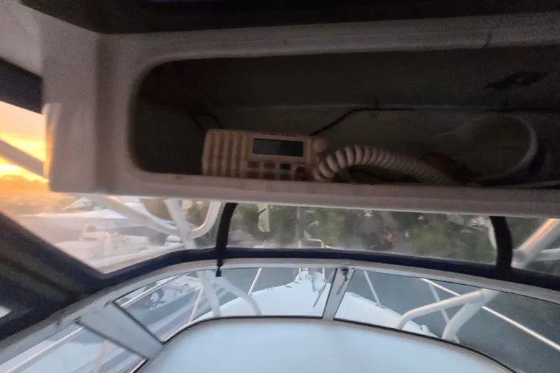 Slide: The Image of Interior view of a 1998 Baha Cruisers 240 WAC boat with radio equipment. - 13