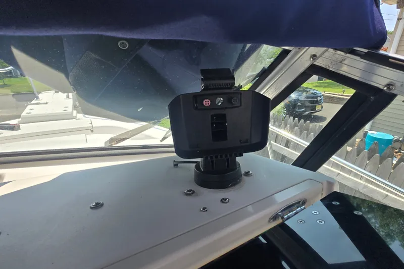 Slide: The Image of Interior view of a 1994 Grady-White Adventure 208 boat with mounted device. - 20