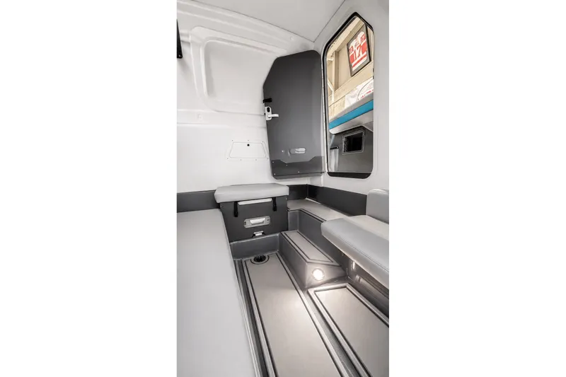 Slide: The Image of Interior cabin of 2025 Sunsation 32 CCX boat, featuring sleek seating and modern design. - 36