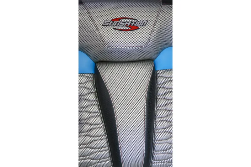 Slide: The Image of 2025 Sunsation 32 CCX boat seat with textured design and logo. - 33