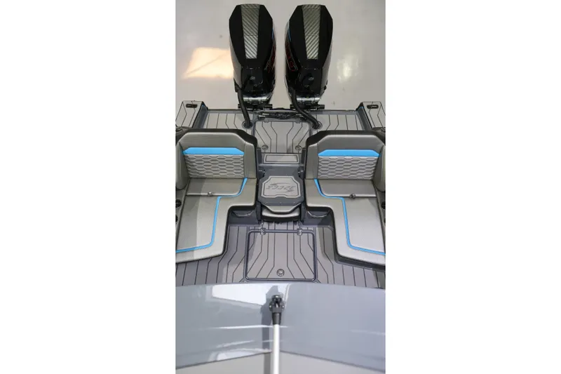 Slide: The Image of 2025 Sunsation 32 CCX boat interior with dual engines and modern seating design. - 17