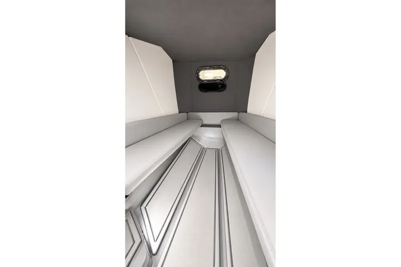Slide: The Image of Interior cabin of 2025 Sunsation 32 CCX boat with sleek seating and window. - 37