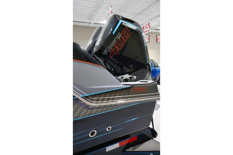 Slide: The Image of 2025 Sunsation 32 CCX boat with powerful 400R engine, sleek design, and modern detailing. - 13