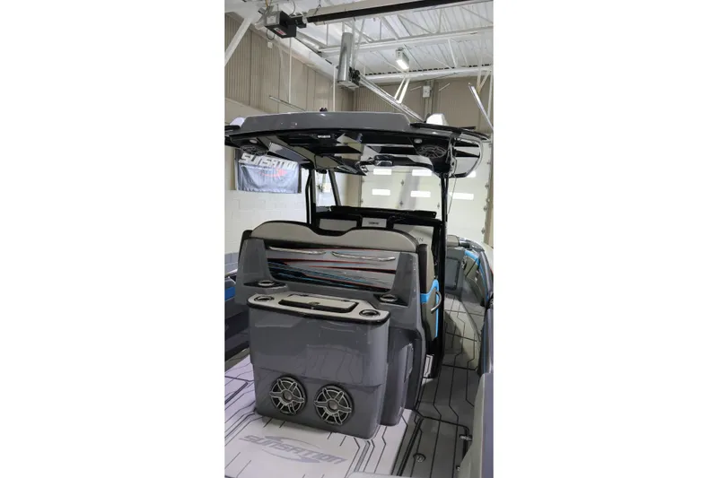 Slide: The Image of 2025 Sunsation 32 CCX boat interior with modern seating and sleek design. - 23