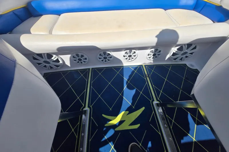 Slide: The Image of Interior of a 1998 Donzi 28 ZX boat with custom flooring and speaker system. - 10