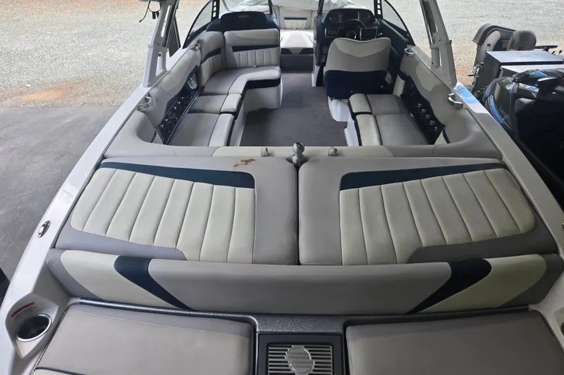 Slide: The Image of 2013 Malibu Wakesetter 24 MXZ interior with spacious seating and modern design. - 28