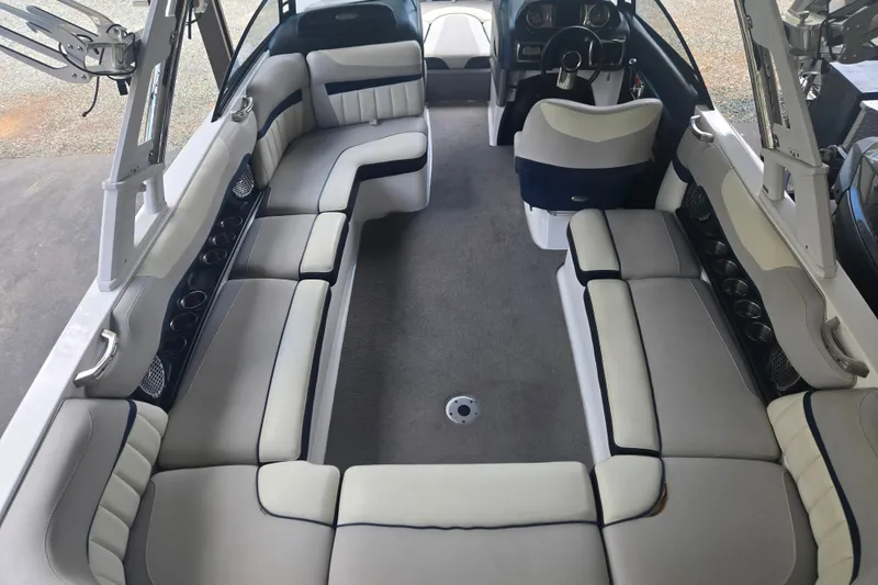 Slide: The Image of Interior of 2013 Malibu Wakesetter 24 MXZ boat with spacious seating and modern design. - 27