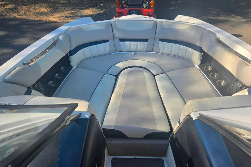 Slide: The Image of Interior of a 2013 Malibu Wakesetter 24 MXZ boat with spacious seating. - 8