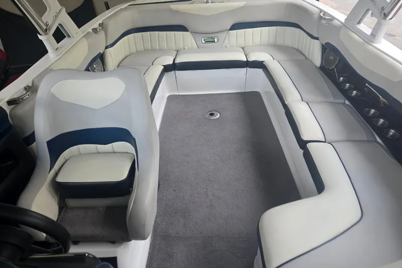 Slide: The Image of Interior of a 2013 Malibu Wakesetter 24 MXZ boat with spacious seating. - 33