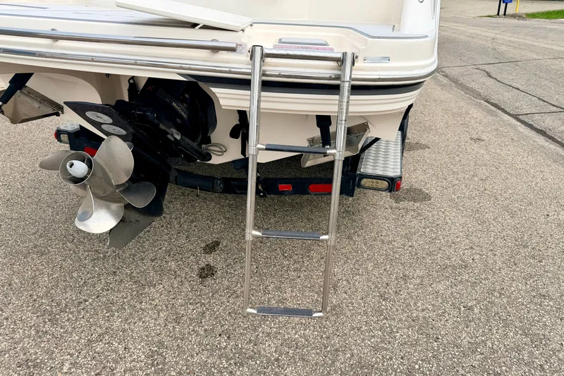 Slide: The Image of Rear view of a 2012 Bryant 268 boat with ladder and propeller. - 22