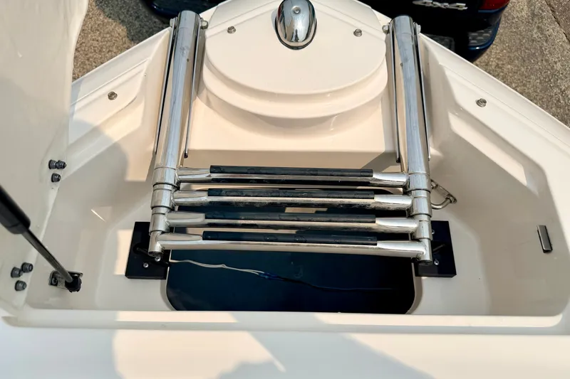 Slide: The Image of 2012 Bryant 268 boat ladder, stainless steel, folded, top view. - 83
