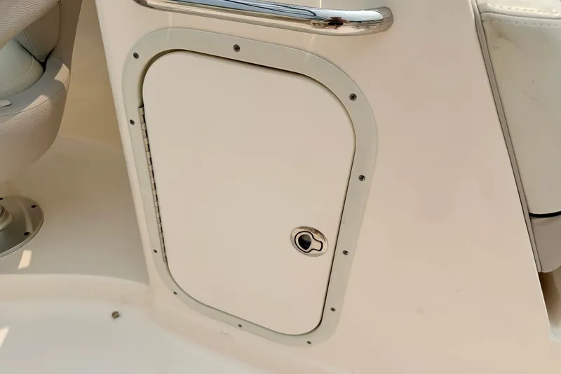 Slide: The Image of Boat storage compartment on a 2012 Bryant 268 model. - 47