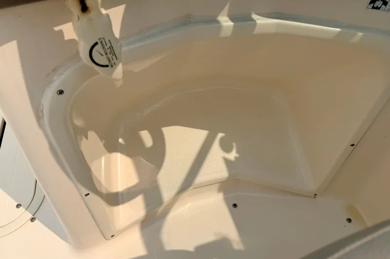 Slide: The Image of Interior view of a 2012 Bryant 268 boat compartment with light shadows. - 98