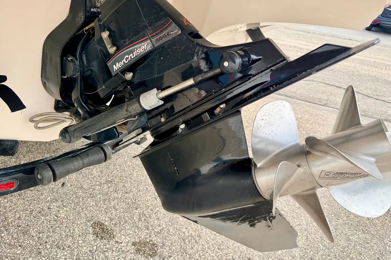Slide: The Image of Close-up of a 2012 Bryant 268 boat's MerCruiser Bravo Three outdrive and propeller. - 17