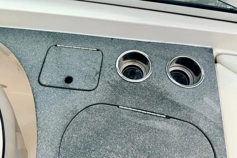 Slide: The Image of Gray countertop with two cup holders on a 2012 Bryant 268 boat. - 45