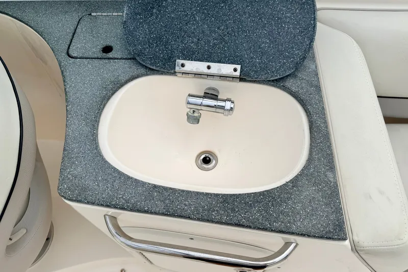 Slide: The Image of Boat sink with closed lid on a 2012 Bryant 268 model. - 44