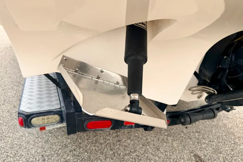 Slide: The Image of Close-up of a 2012 Bryant 268 boat trim tab and hydraulic actuator. - 18