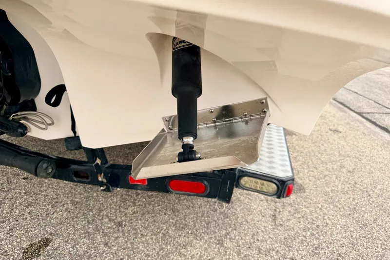 Slide: The Image of Close-up of a 2012 Bryant 268 boat trim tab mechanism on a trailer. - 19