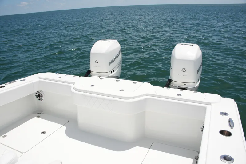 Slide: The Image of Freeman 34VH 2018 boat with dual Mercury outboard engines on open sea. - 65