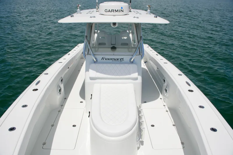 Slide: The Image of 2018 Freeman 34VH boat with Garmin equipment on open water. - 43