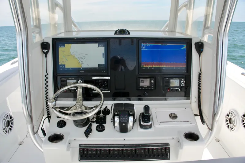 Slide: The Image of Freeman 34VH 2018 boat dashboard with navigation and communication equipment. - 51
