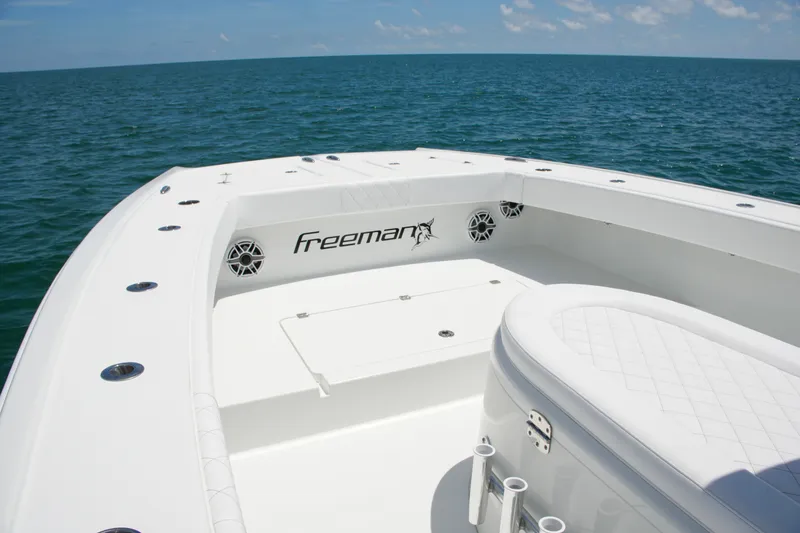 Slide: The Image of 2018 Freeman 34VH boat deck with ocean view, showcasing sleek design and spacious seating. - 36