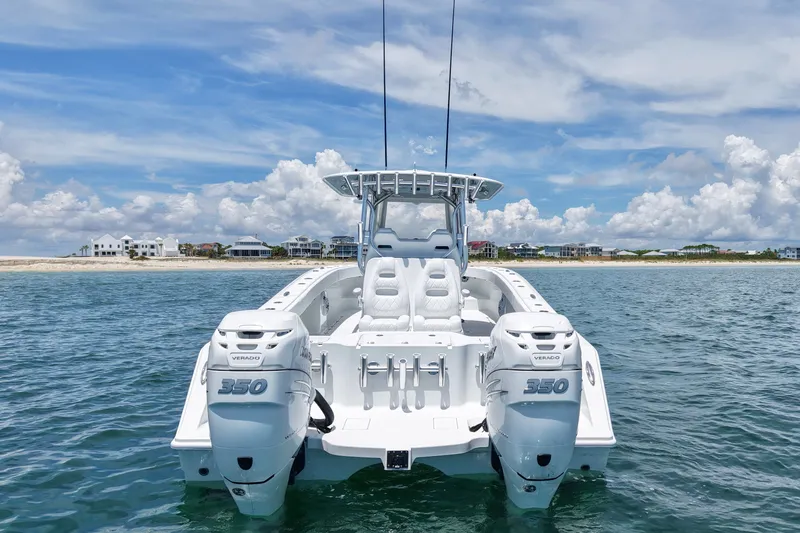 Slide: The Image of 2018 Freeman 34VH boat with twin Verado 350 engines on open water. - 9