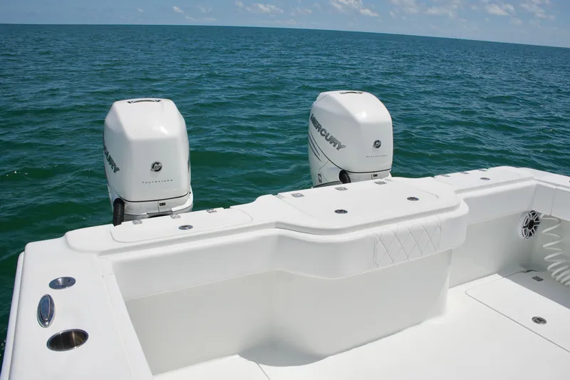 Slide: The Image of Freeman 34VH 2018 boat with dual Mercury outboard engines on open sea. - 61