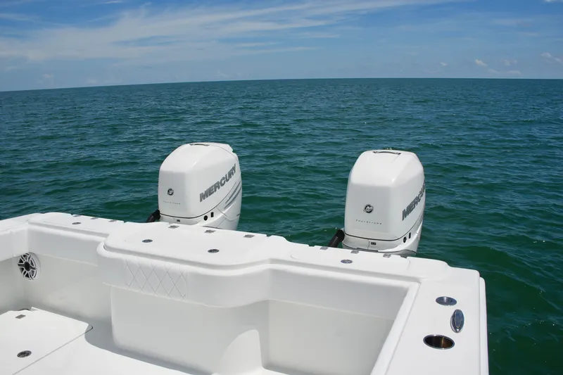 Slide: The Image of Freeman 34VH 2018 boat with twin Mercury engines on open sea. - 64