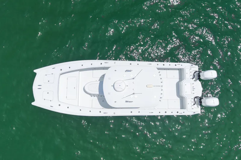 Slide: The Image of Aerial view of 2018 Freeman 34VH boat on green water. - 30