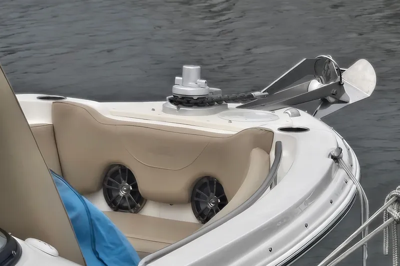 Slide: The Image of 2020 NauticStar 2302 Legacy Dual Console boat bow with anchor and seating. - 3