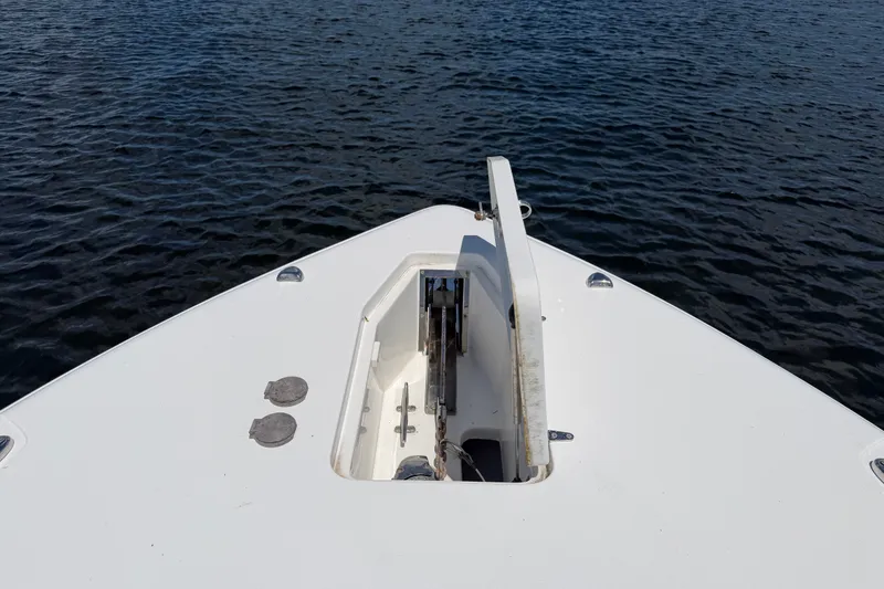 Slide: The Image of Bow view of 2019 Sea Hunt Gamefish 30 boat on water. - 25