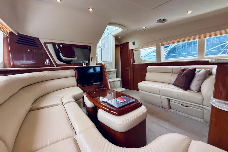 Slide: The Image of Luxurious interior of 2003 Sea Ray 480 Motor Yacht with plush seating and elegant decor. - 41
