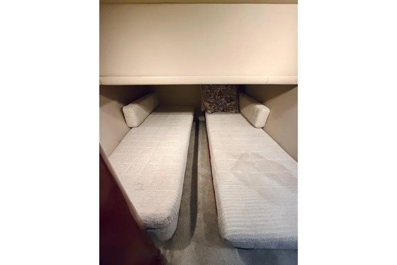 Slide: The Image of Interior cabin of 2003 Sea Ray 480 Motor Yacht with twin beds and cushions. - 50