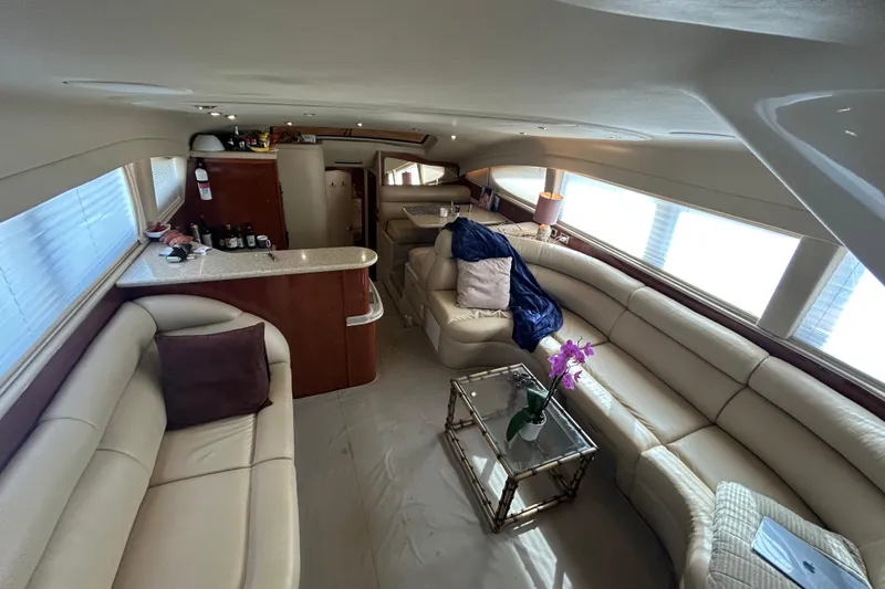 Slide: The Image of Luxurious interior of a 2003 Sea Ray 480 Motor Yacht with elegant seating and decor. - 37